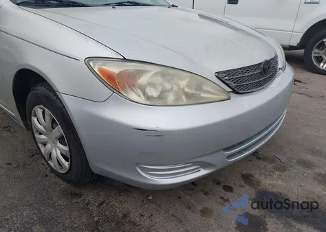 2003 Toyota Camry Le z USA, uszkodzony, nr VIN 4T1BE32K33U686148